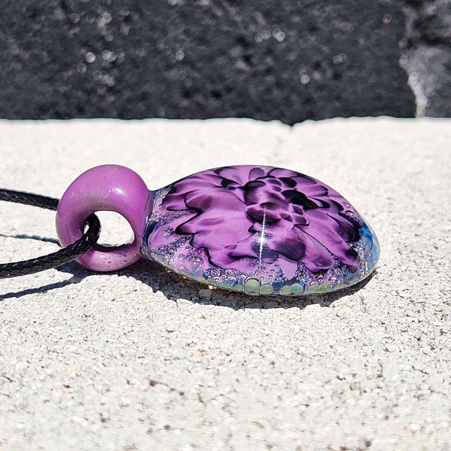 Handblown Borosilicate Glass Pendant: Purple and Black on a Multicolor Background