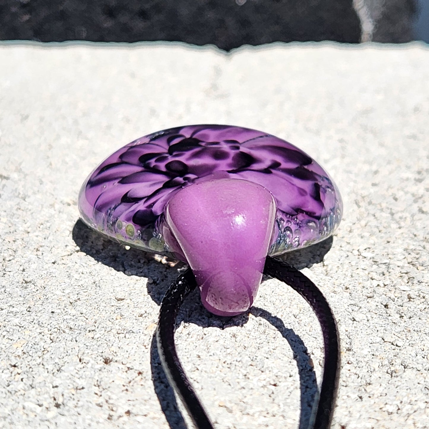 Handblown Borosilicate Glass Pendant: Purple and Black on a Multicolor Background