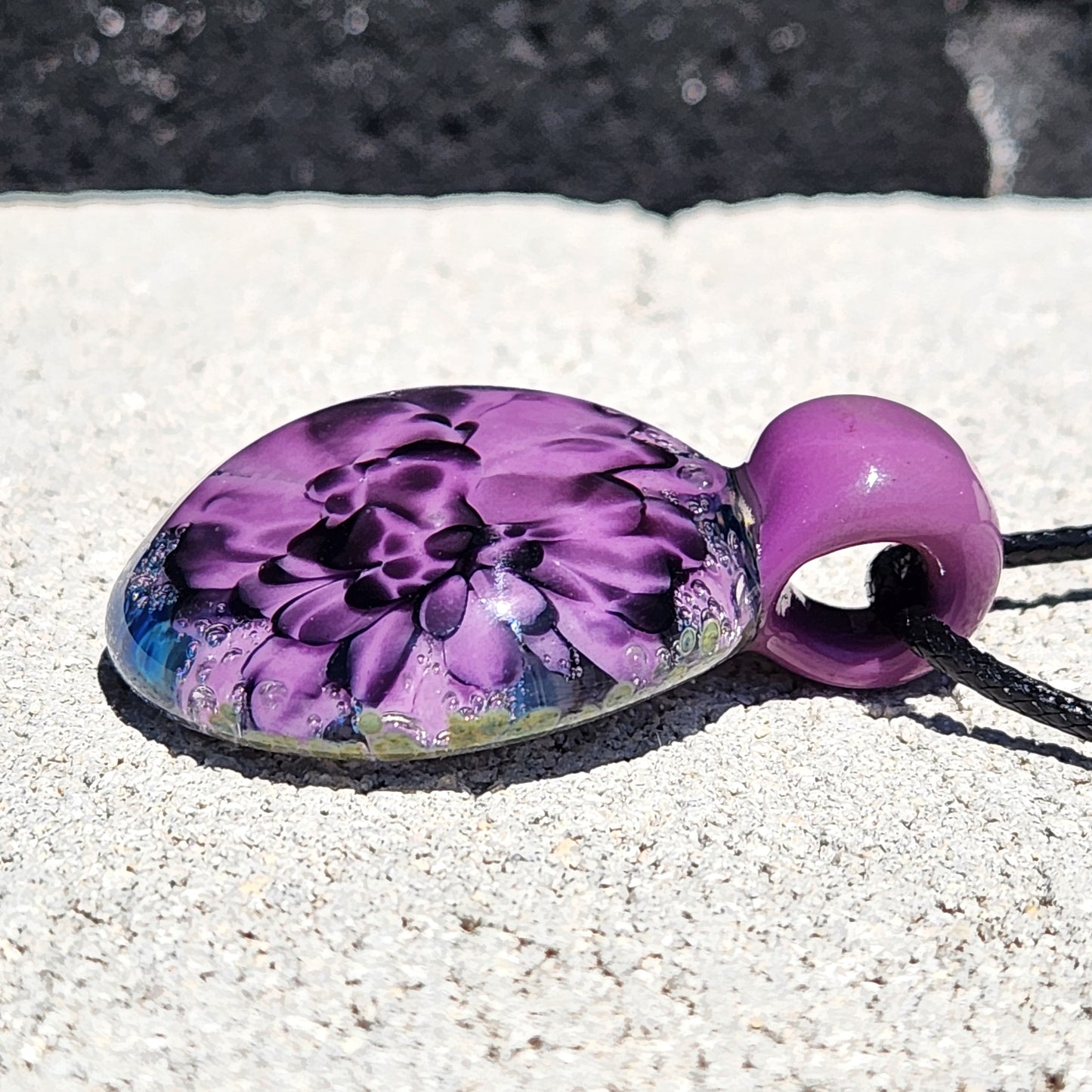Handblown Borosilicate Glass Pendant: Purple and Black on a Multicolor Background