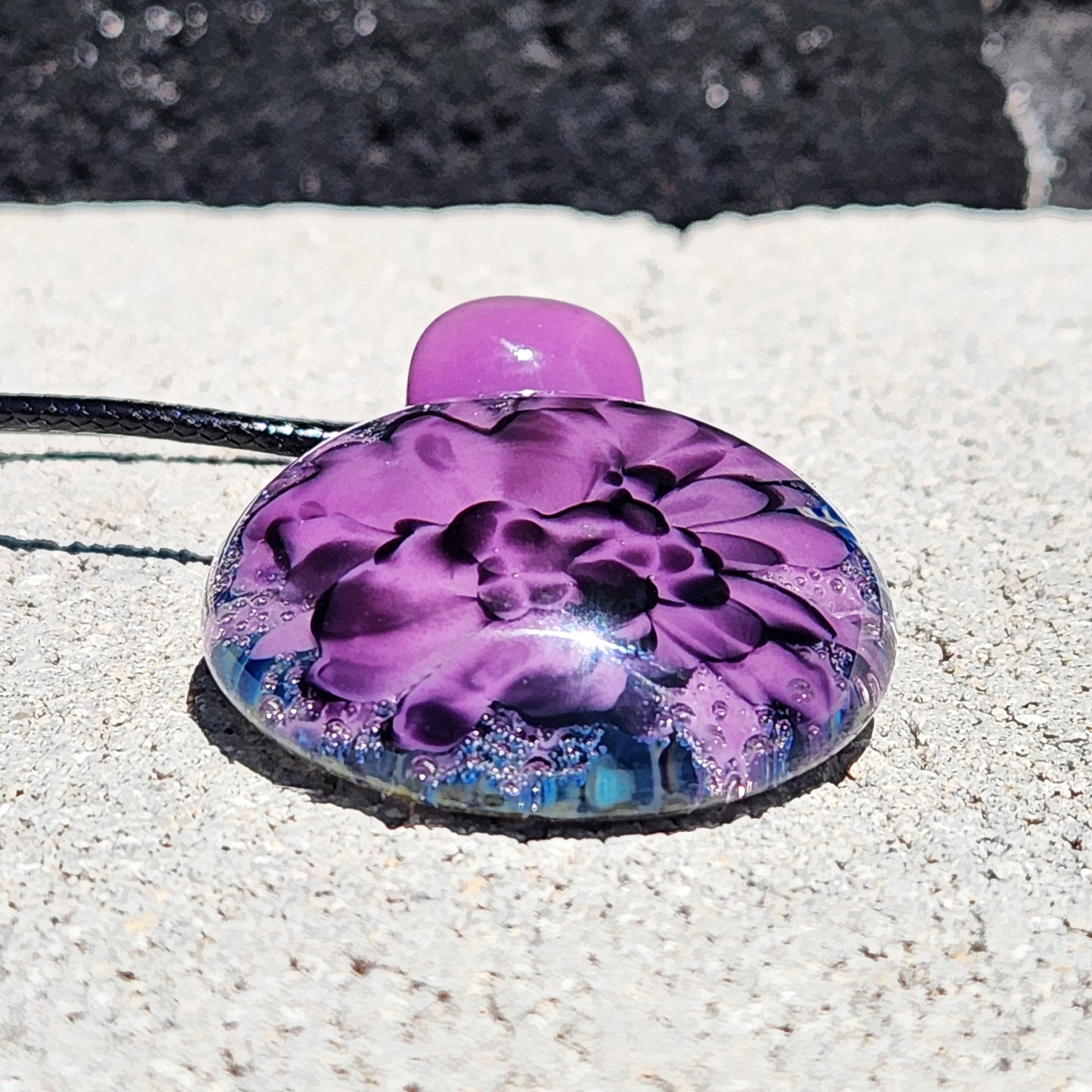 Handblown Borosilicate Glass Pendant: Purple and Black on a Multicolor Background