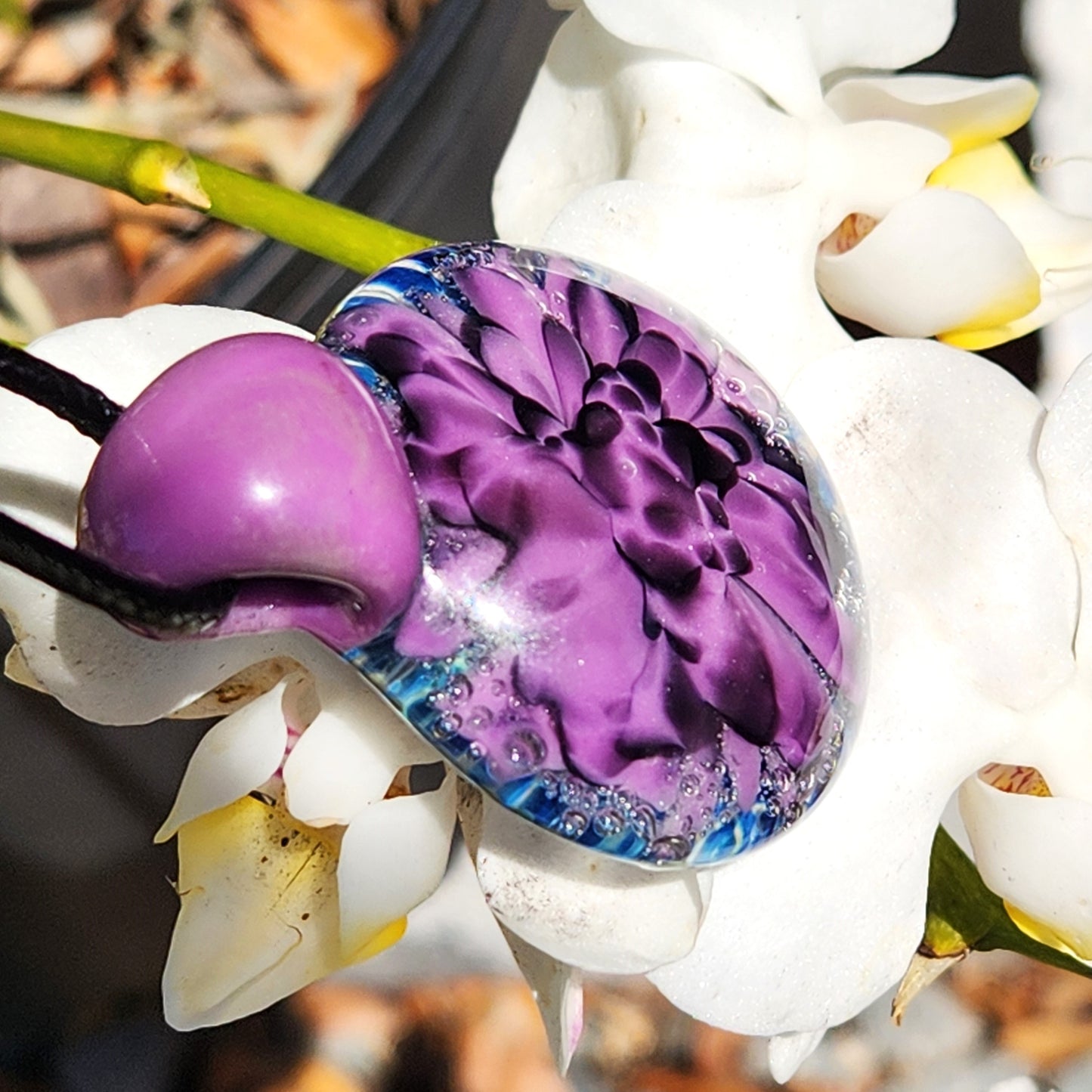 Handblown Borosilicate Glass Pendant: Purple and Black on a Multicolor Background