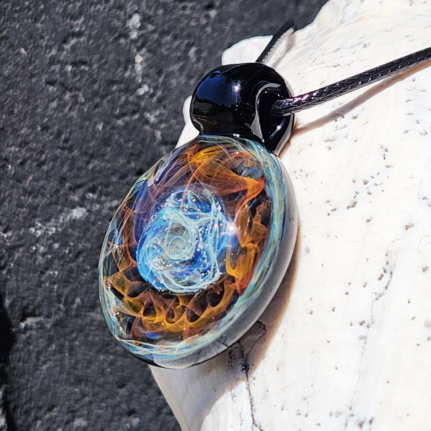Cosmic Elegance: Handcrafted Glass Pendant with Silver and Gold Accents