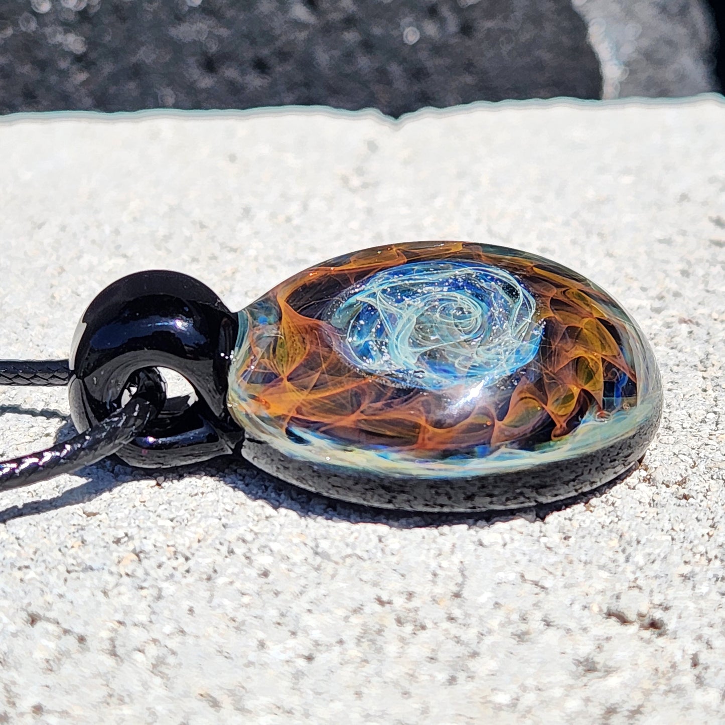 Cosmic Elegance: Handcrafted Glass Pendant with Silver and Gold Accents