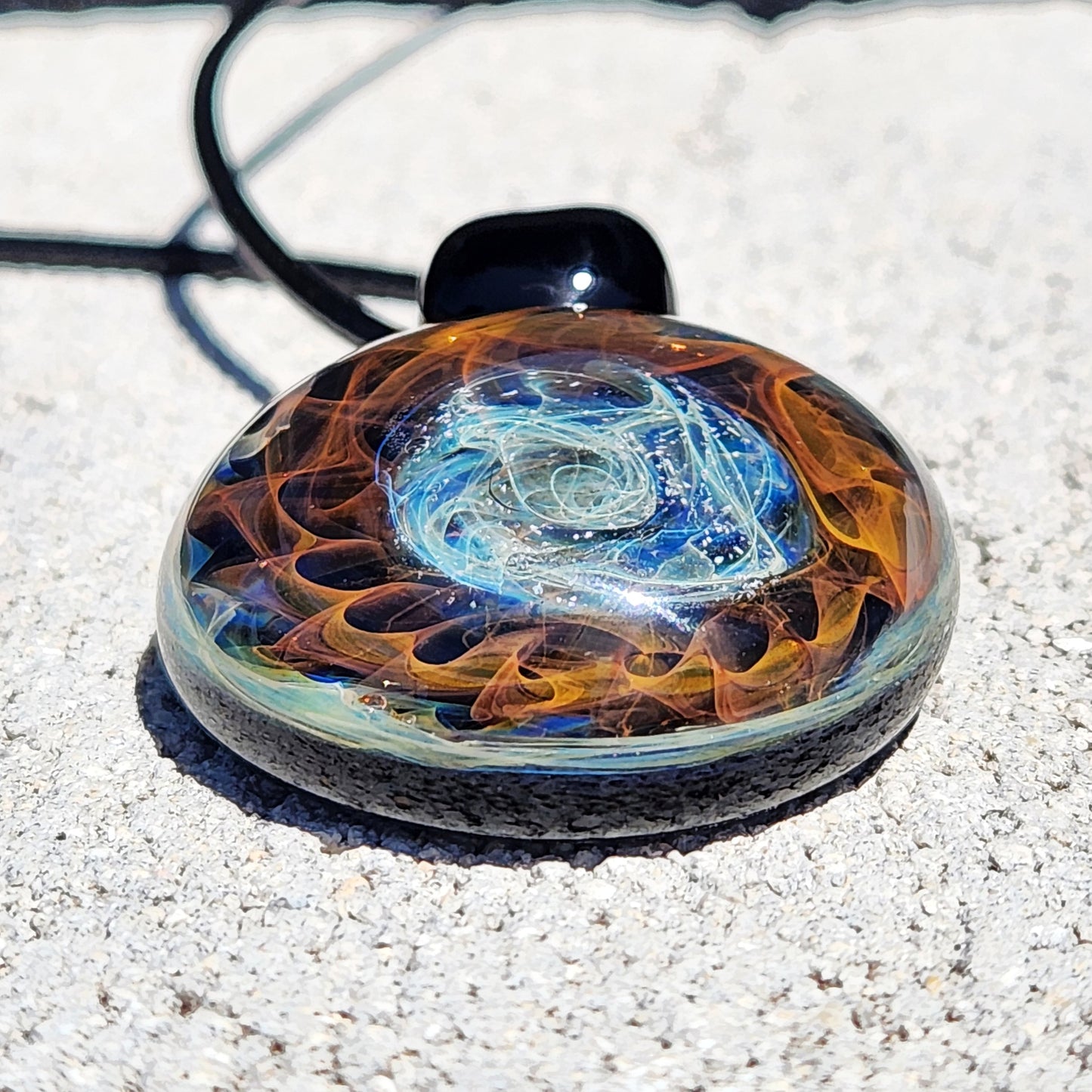 Cosmic Elegance: Handcrafted Glass Pendant with Silver and Gold Accents