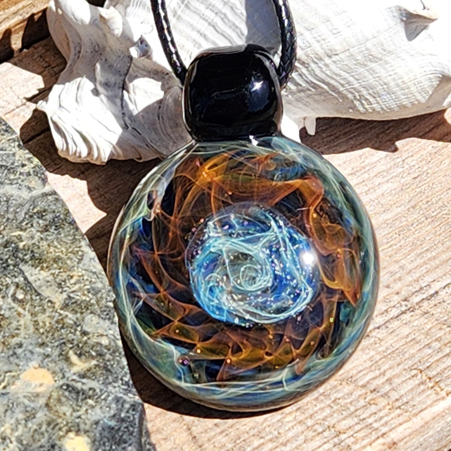 Cosmic Elegance: Handcrafted Glass Pendant with Silver and Gold Accents