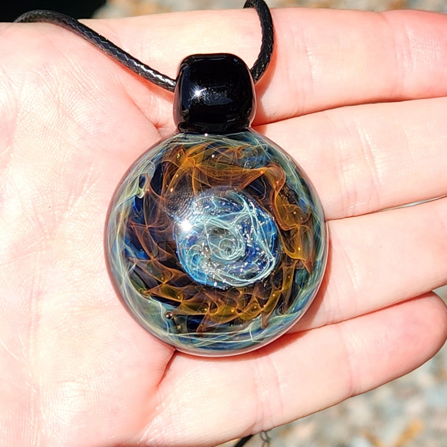 Cosmic Elegance: Handcrafted Glass Pendant with Silver and Gold Accents