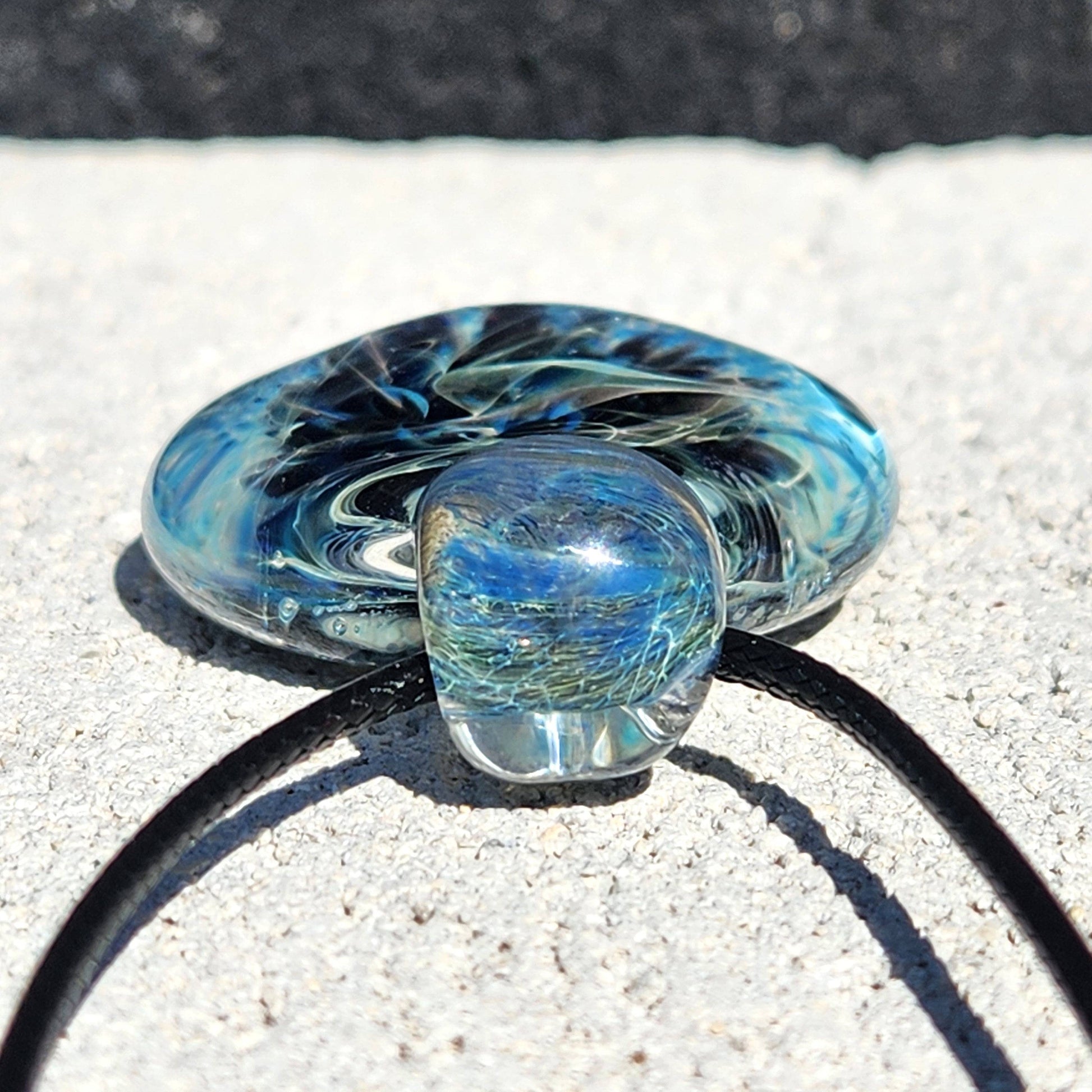 Close-up of Handmade Pendant Necklace – Winter Scene Borosilicate Glass Pendant loop showing fine glass threading and texture.