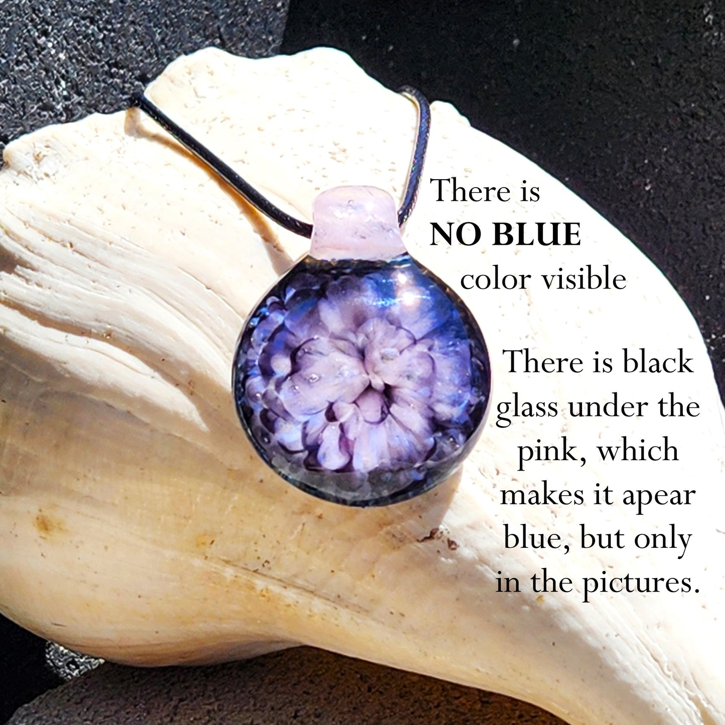 Crushed glass flower pendant necklace with pink and black tones, shown with text clarifying no blue color is present in real life.