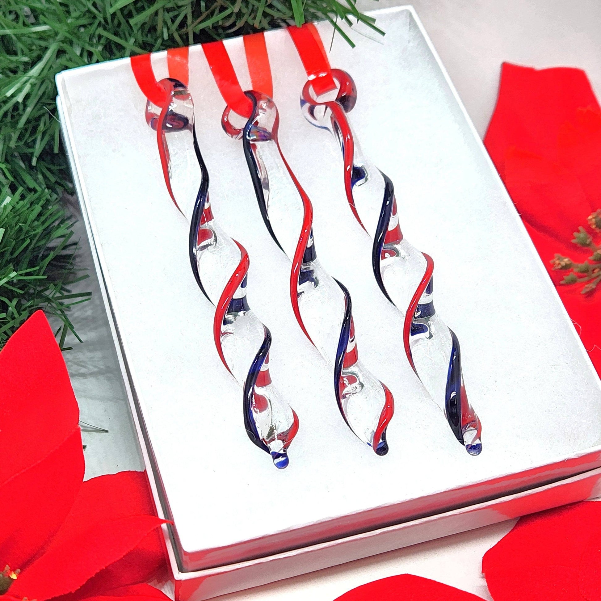 Set of Red & Blue Glass Christmas Ornaments in a gift box, featuring handmade twisted icicle shapes perfect for winter holiday decorations.