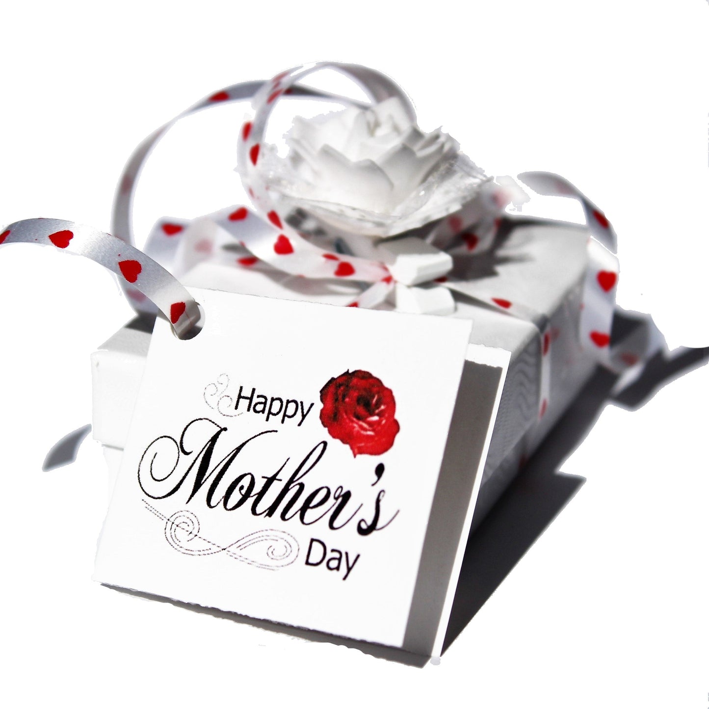 Mother's Day elegant gift wrapping with heart ribbon and floral tag on a white box. Perfect for celebrating every occasion in style.