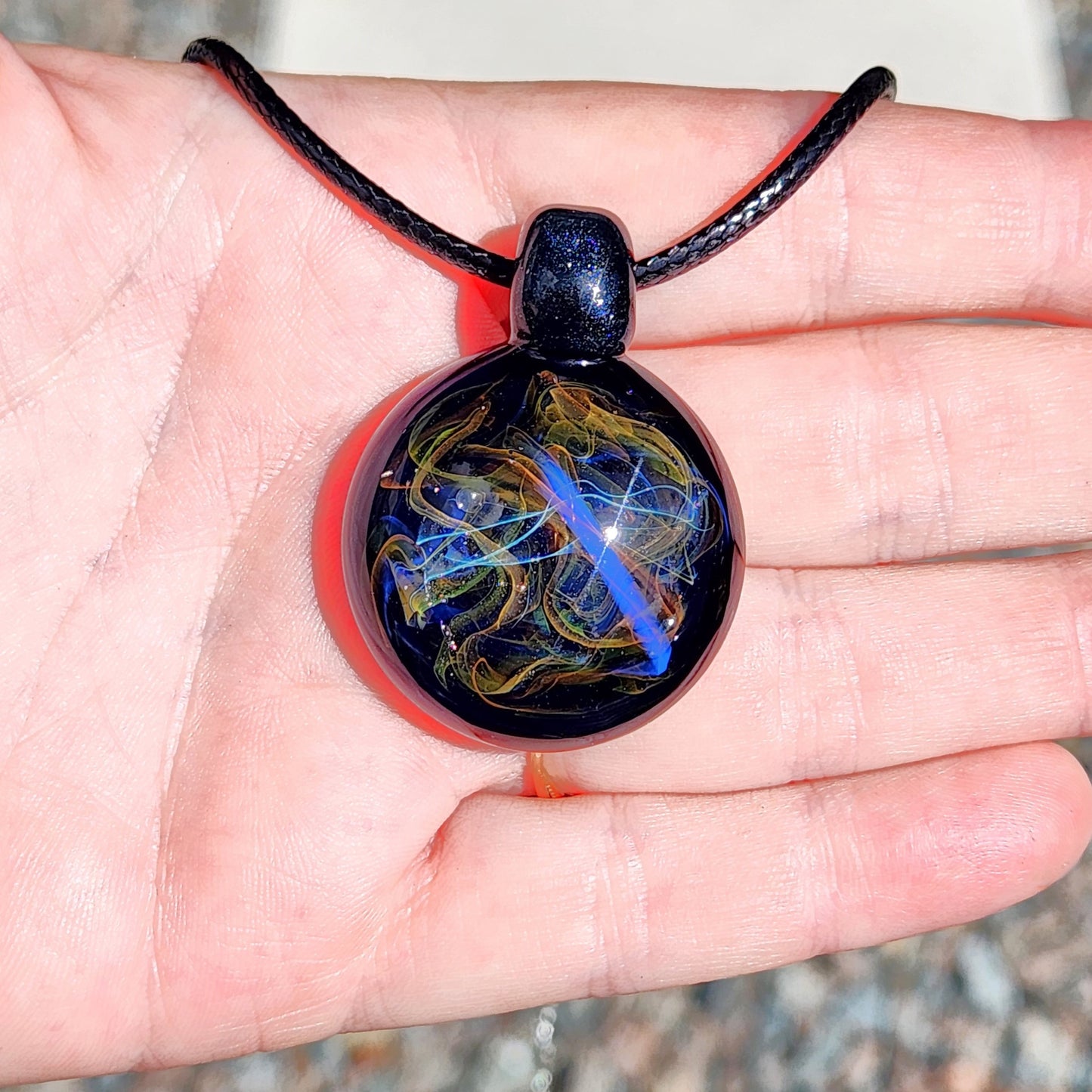 Cosmic Elegance: Handcrafted Glass Pendant with Silver, Gold, and Purple Accents