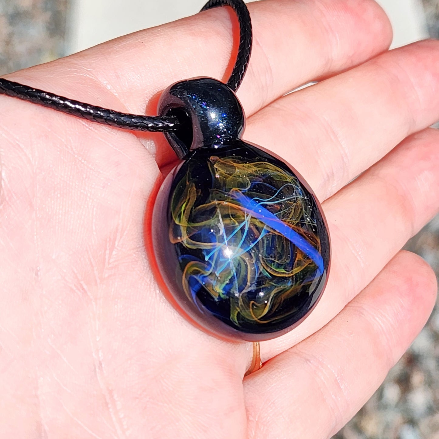 Cosmic Elegance: Handcrafted Glass Pendant with Silver, Gold, and Purple Accents