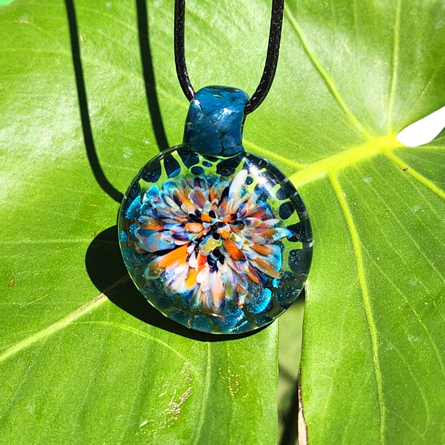 Handmade Blown Glass Pendant: Captivating Borosilicate Art