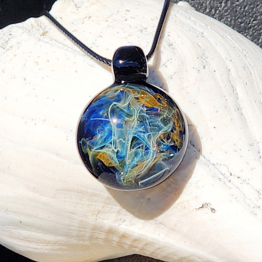 Cosmic Elegance: Handcrafted Glass Pendant with Silver and Gold Accents