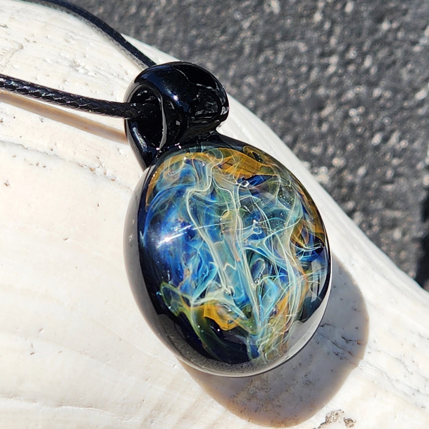 Cosmic Elegance: Handcrafted Glass Pendant with Silver and Gold Accents