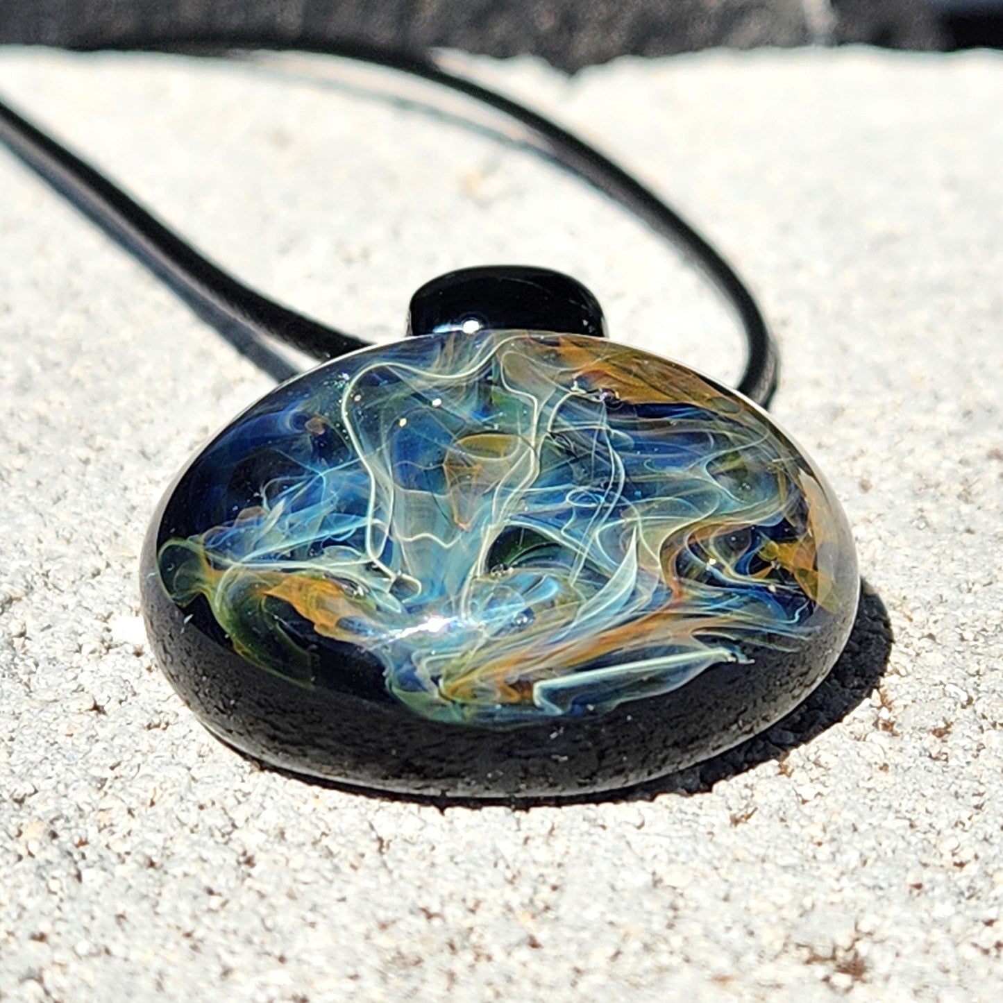 Cosmic Elegance: Handcrafted Glass Pendant with Silver and Gold Accents