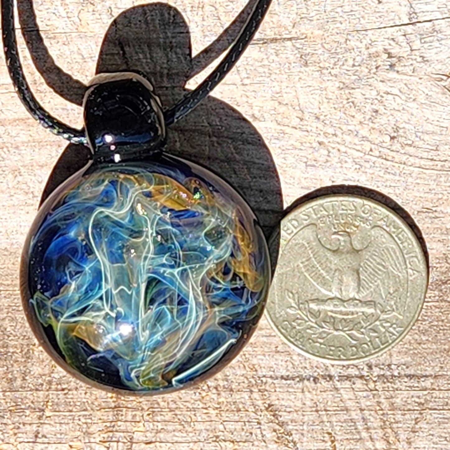 Cosmic Elegance: Handcrafted Glass Pendant with Silver and Gold Accents