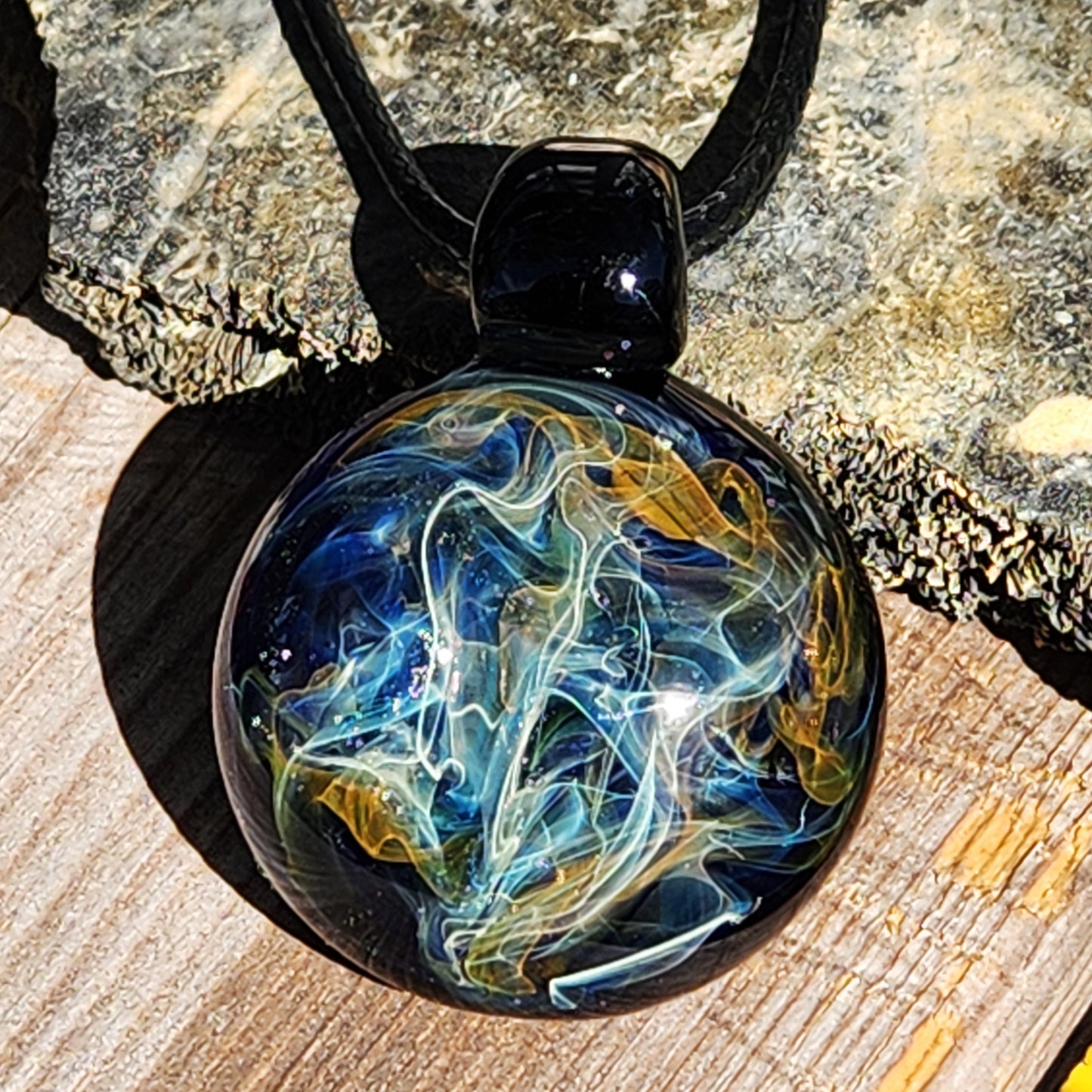 Cosmic Elegance: Handcrafted Glass Pendant with Silver and Gold Accents