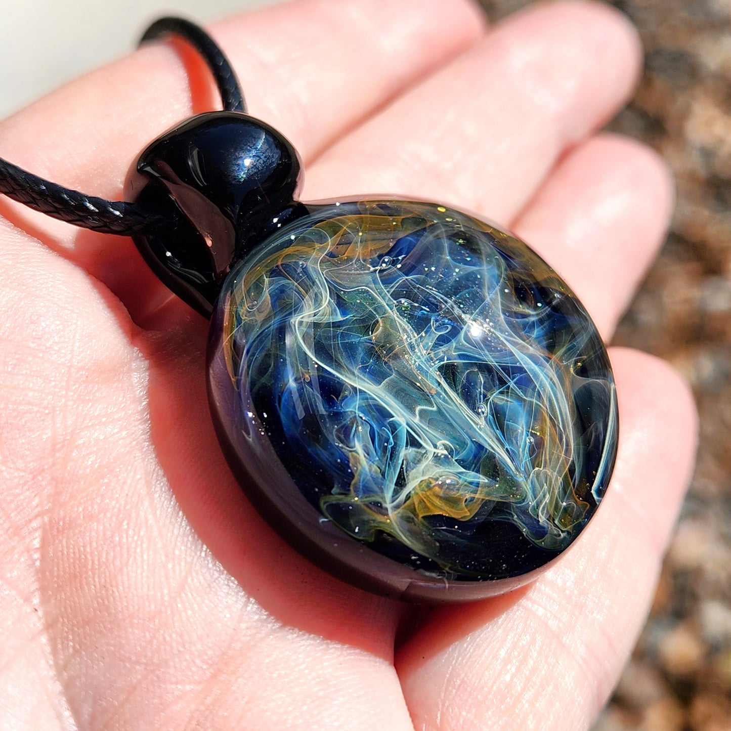 Cosmic Elegance: Handcrafted Glass Pendant with Silver and Gold Accents