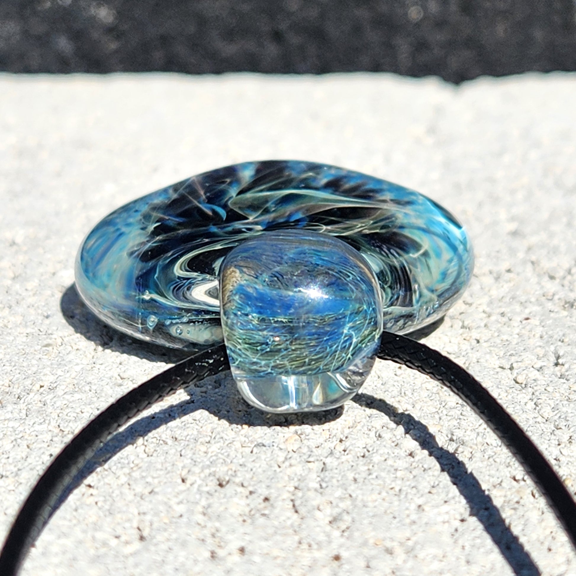 Close-up of Handmade Pendant Necklace – Winter Scene Borosilicate Glass Pendant loop showing fine glass threading and texture.