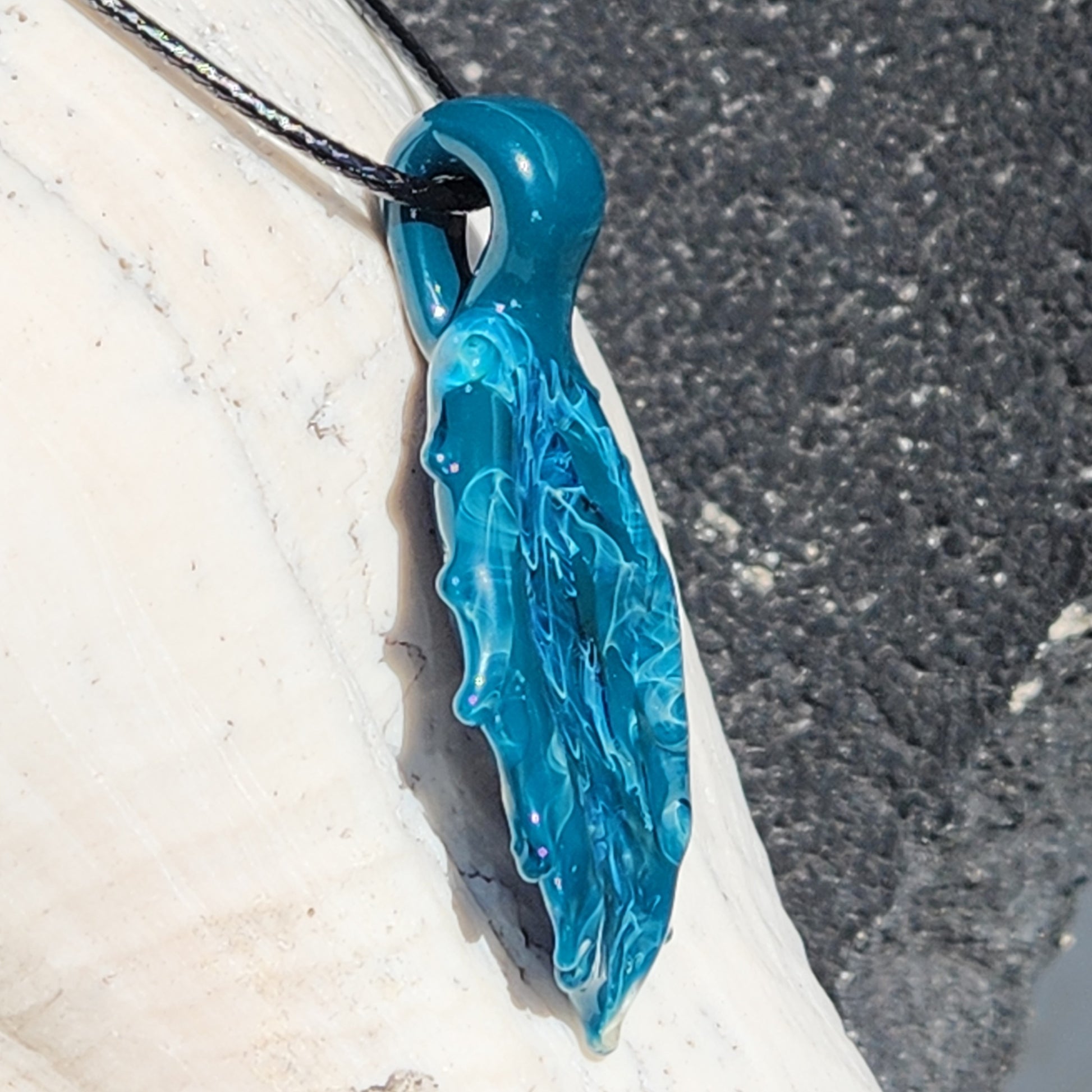 Side view of Ocean Drift Glass Pendant Necklace showing layered glass details and curved bail, ideal handmade gift for beach jewelry fans.