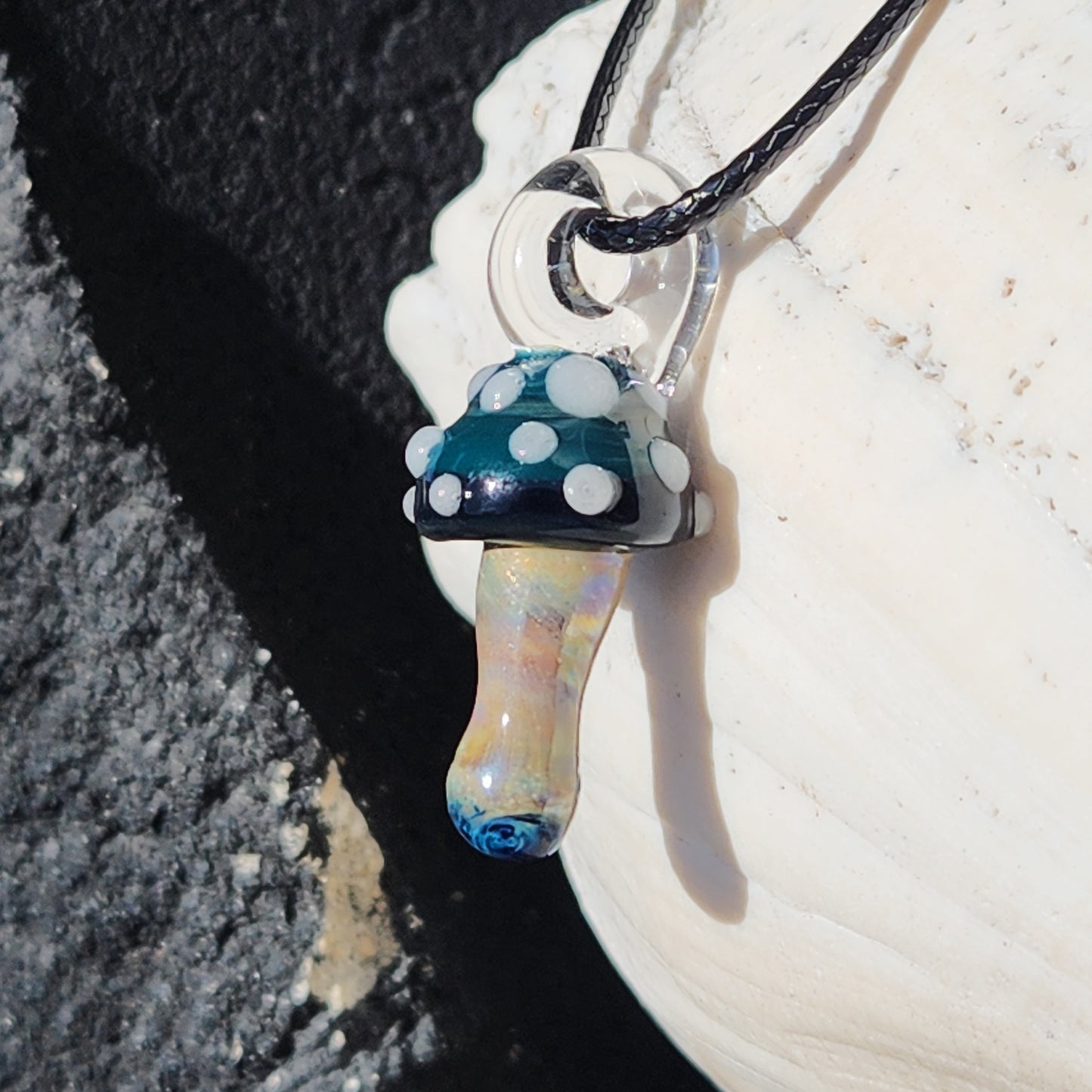Boho-style Blue Mushroom Glass Pendant Necklace with shimmering stem and dotted blue cap, perfect for whimsical jewelry collections.