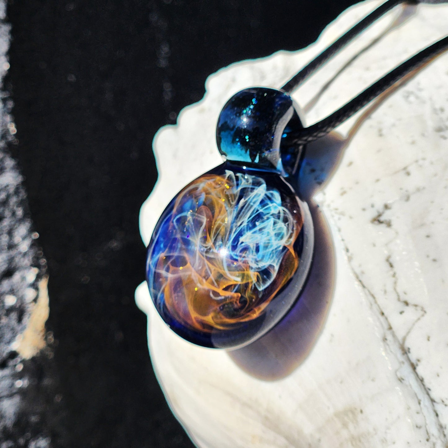 Gold & Silver Fumed Glass Pendant on Deep Blue Background