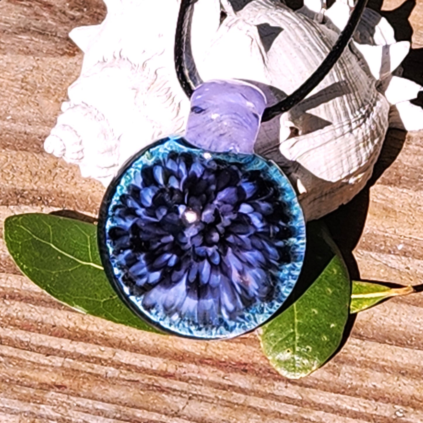 Purple Pink Borosilicate Glass Pendant Necklace on wooden background