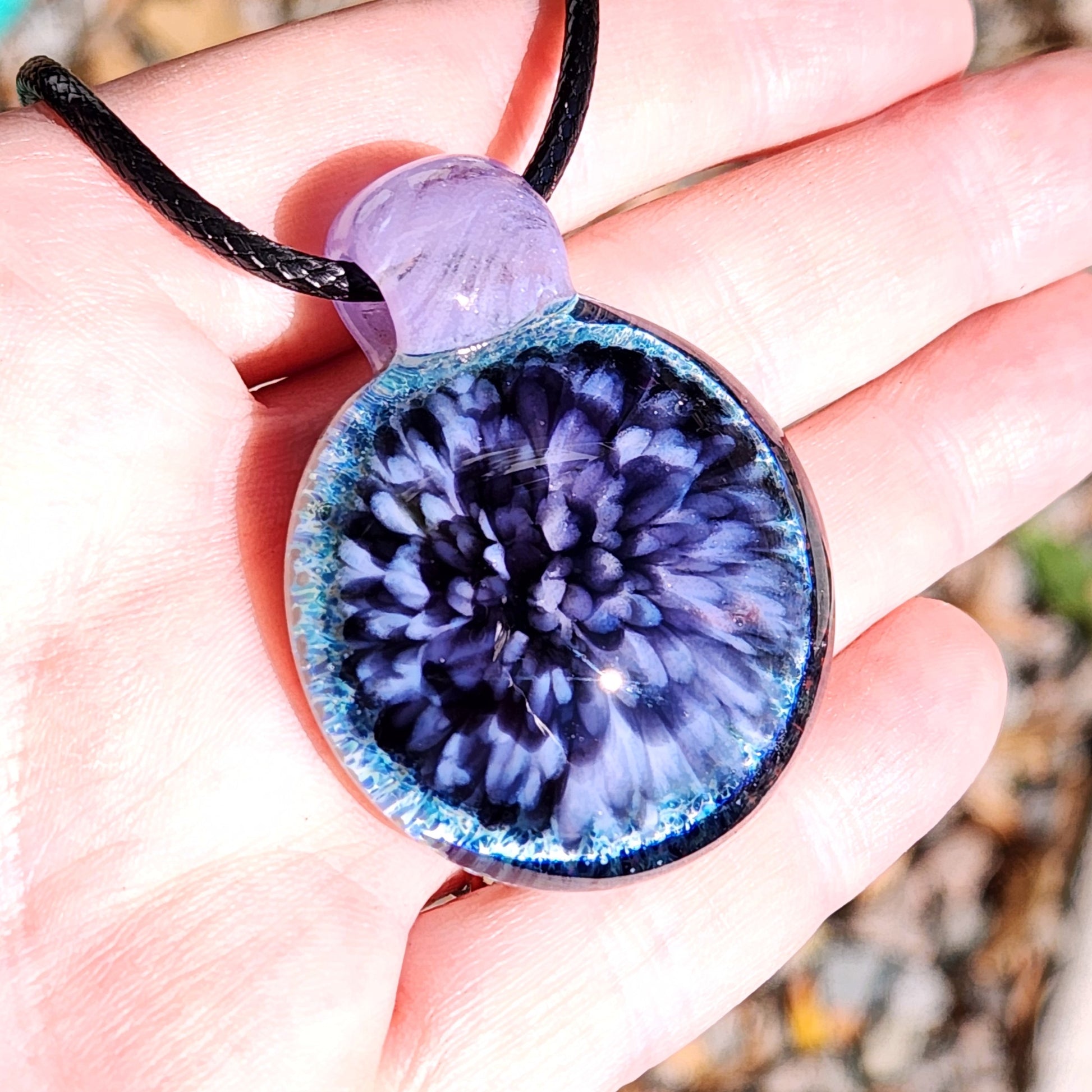 Purple Pink Borosilicate Glass Pendant Necklace on hand