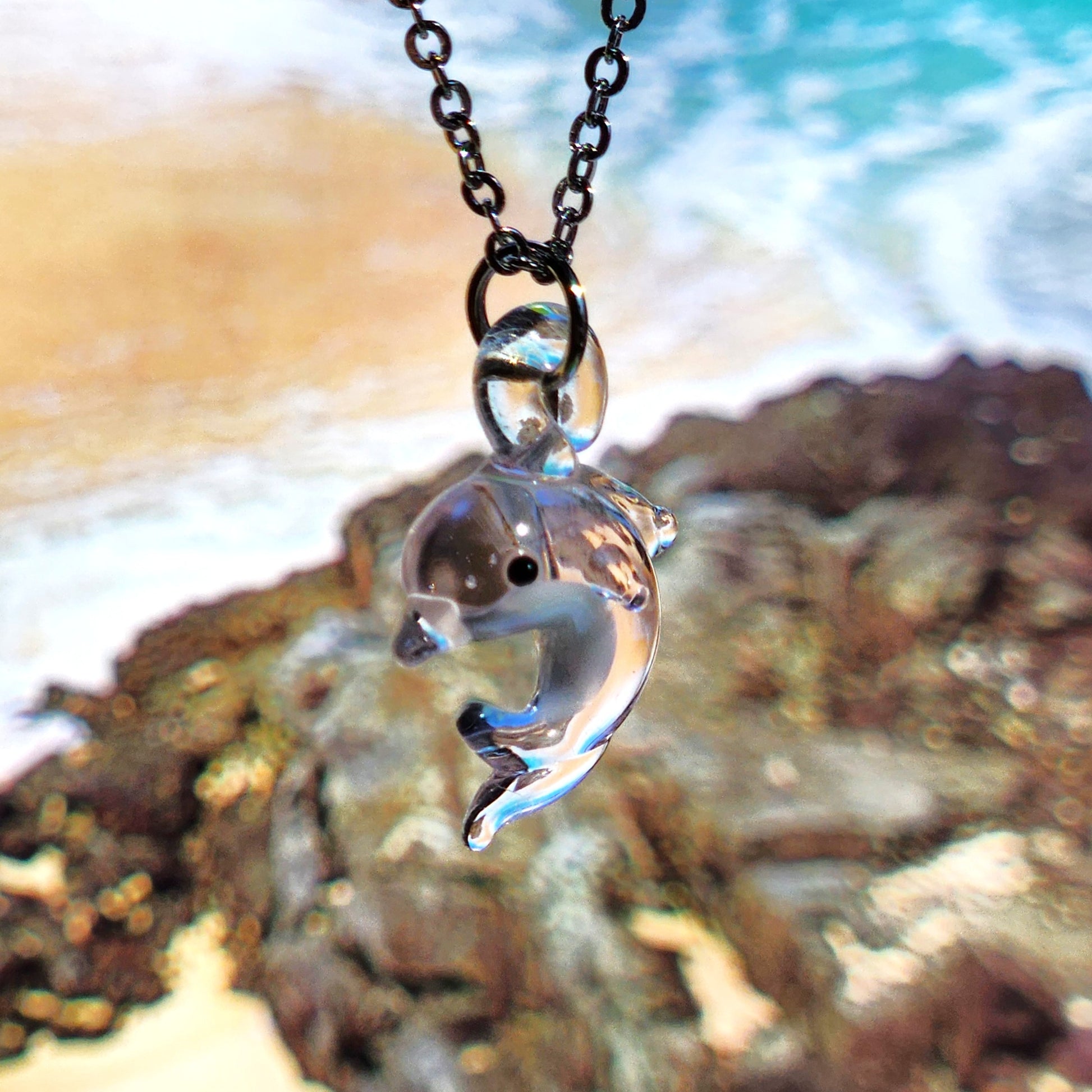 Clear dolphin pendant necklace