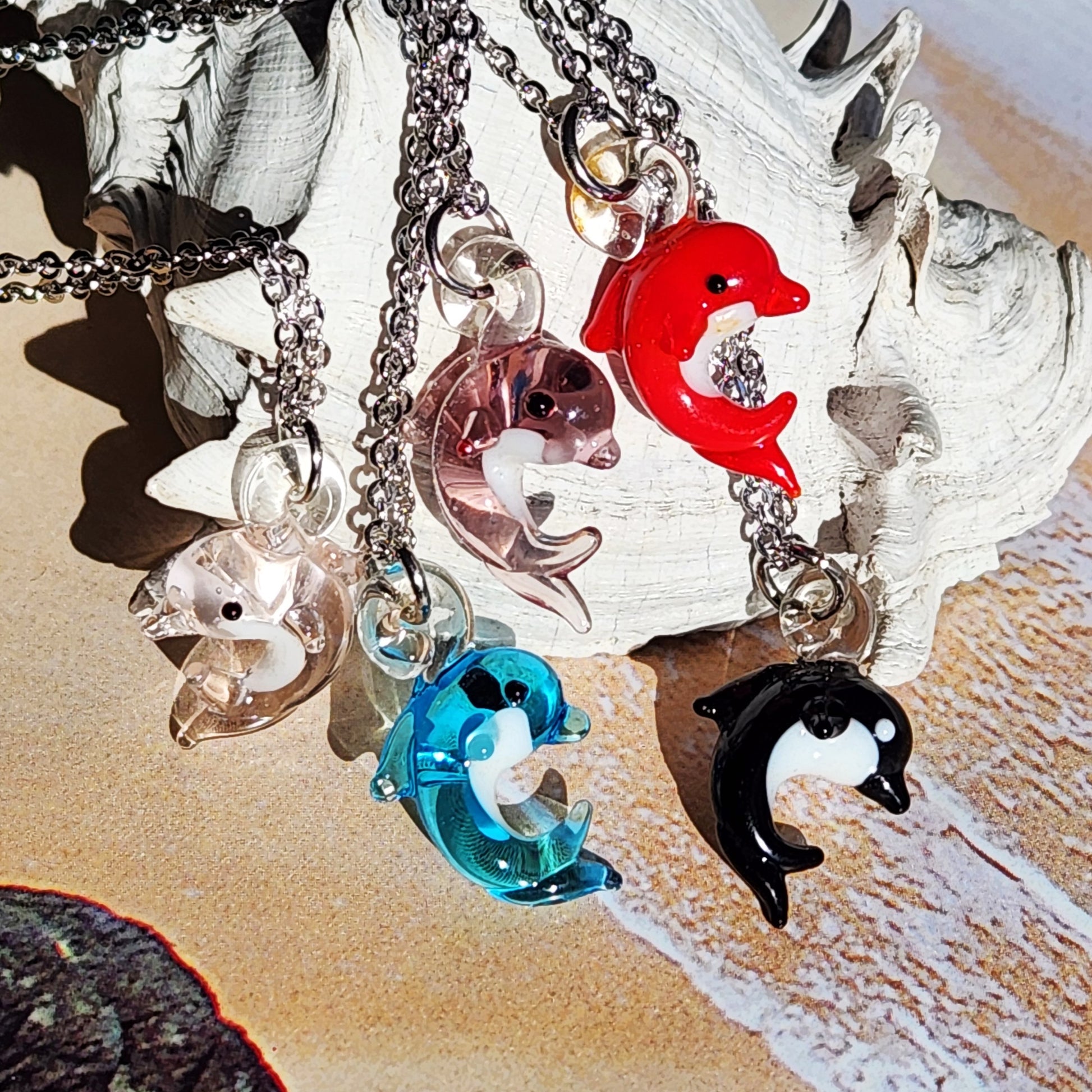 Colorful dolphin pendants on chains