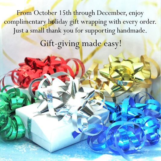 Holiday gift wrapping promotion with colorful bows and white gift boxes, highlighting free wrapping for handmade glass ornaments.